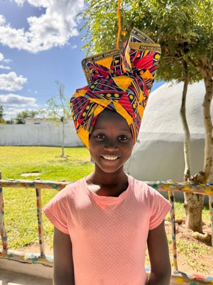Portrait of N&eacute;usia, a child at Goodwill Vulnerable Children's Home