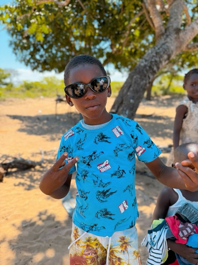A boy from the Goodwill community on an outreach visit