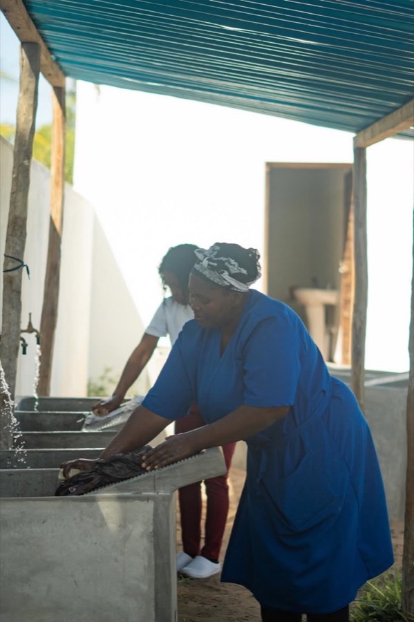 A member of the Goodwill team preparing food in the kitchen