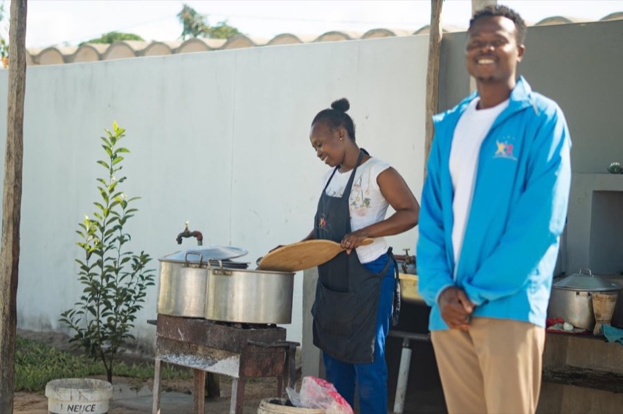 A Goodwill cook at work in the outside kitchen