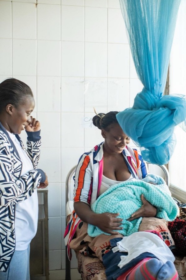 A mother receiving support from the Goodwill team