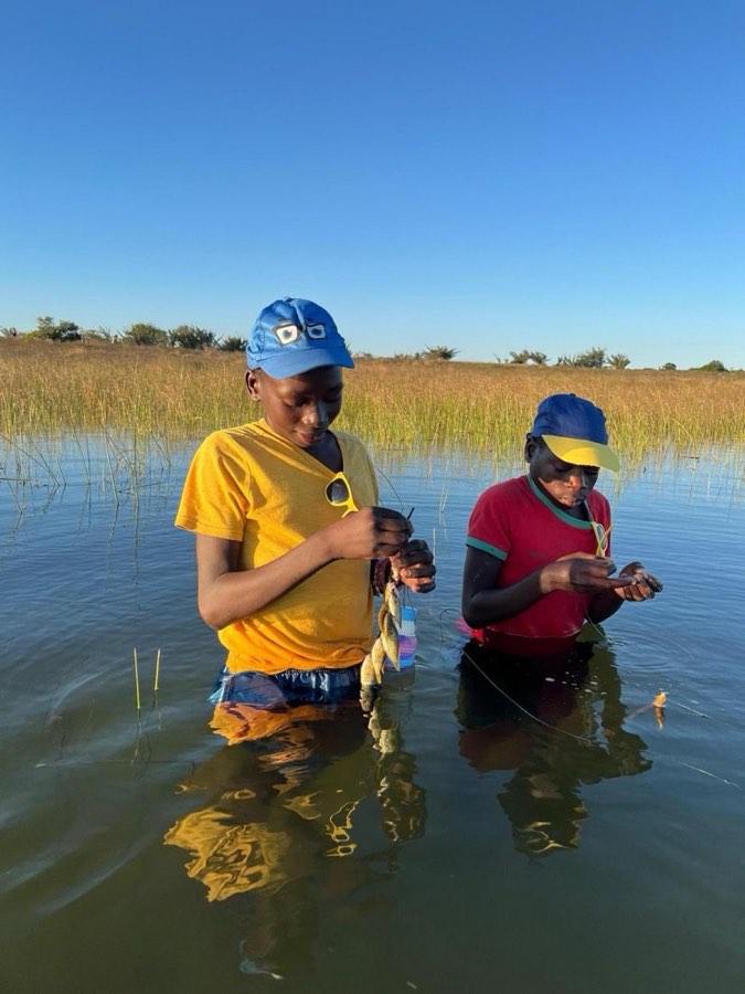 Children fishing at the lakes near Vilankulo